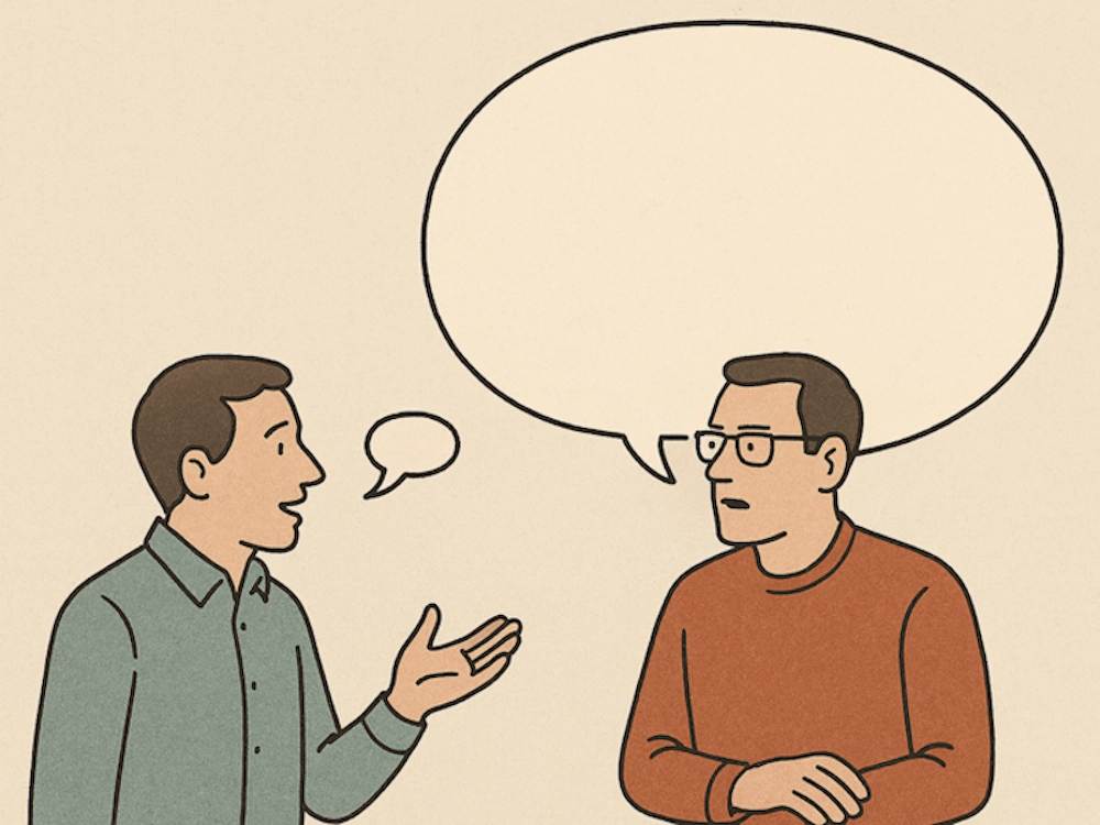 Deux hommes conversent, avec une petite et une immense bulle de paroles au-dessus d’eux. 