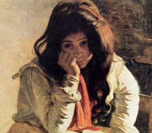 Jeune femme dont le visage exprime une profonde tristesse