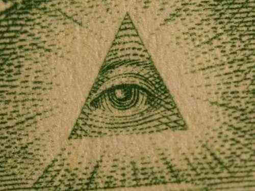Dessin symbolique d’un oeil dans un triangle