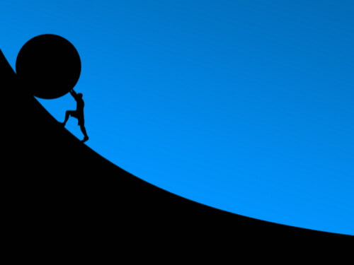 Mythe de Sisyphe : un homme pousse un rocher rond vers le sommet d'une montagne.