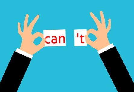 Une main qui enlève «’t» dans «can’t».