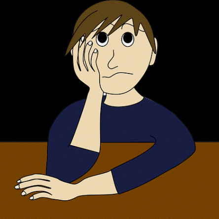 Un garçon triste supporte sa tête avec son bras.
