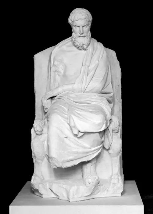 Photo d'une statue d'Épicure assis sur un trône.